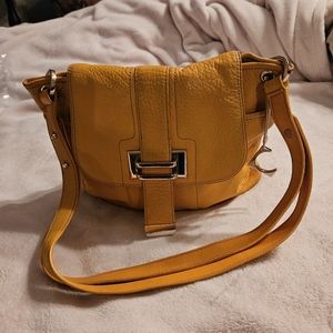 Yellow on shoulder bag